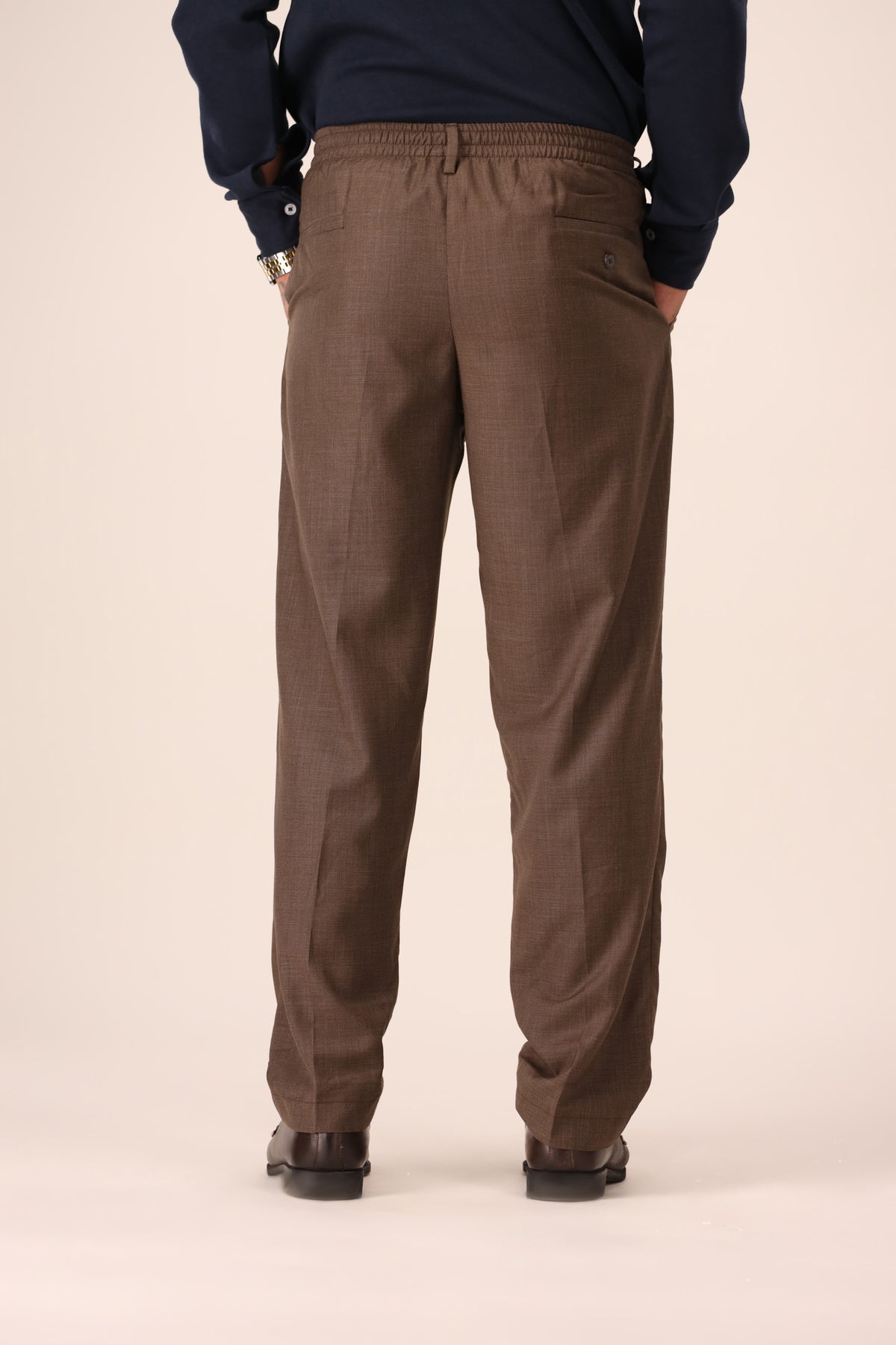Beige Textured Pleated Trousers